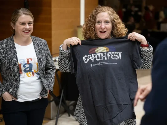 ef-2024-10 UW-Madison Chancellor Jennifer Mnookin showing off the Earth Fest logo on a T-shirt.